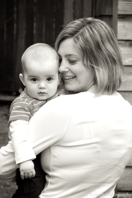 Sepia mother with son over shoulder - family portrait photography sydney
